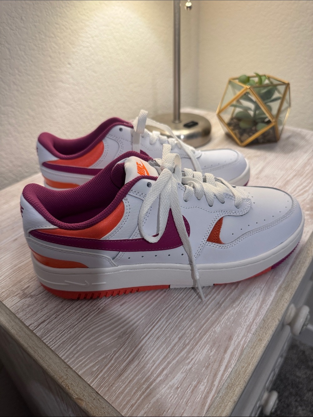 Nike Women's White Sneakers with Pink and Orange Accents